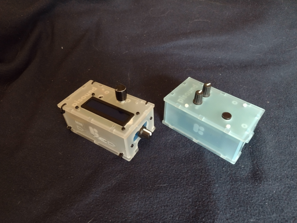 Picture of the MiniDexed (on the right) and the pisound (on the right) viewed from their front right corner.